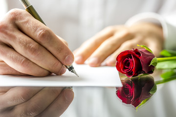 Obraz premium Romantic man writing a love letter