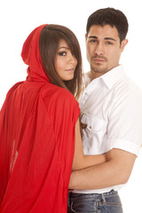 man and red riding hood arms looking