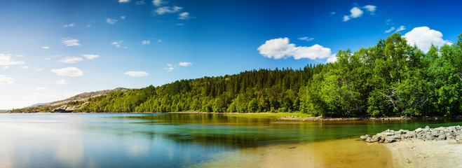 Panoramic long exposure shot of a lake in Northern Norway