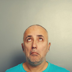 Fototapeta premium portrait of senior man looking up