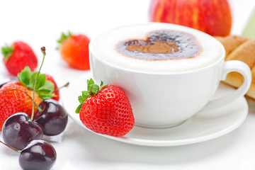 cappuccino in a cup in the shape of hearts,cherry,croissant  and