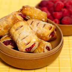 Raspberry filled pastries with sugar sprinkles