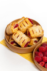 Raspberry filled pastries with sugar sprinkles