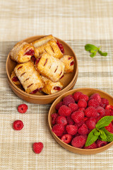 Raspberry filled pastries with sugar sprinkles