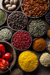  Spices on wooden bowl background 