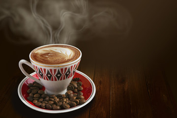 Cup of coffee  and coffee beans