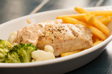 chicken breast with french fries