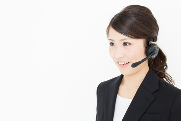 young asian businesswoman on with headset