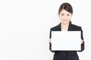 Naklejka premium young asian businesswoman with whiteboard