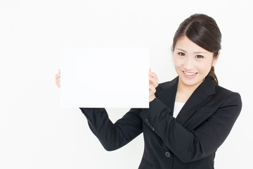 Fototapeta premium young asian businesswoman with whiteboard