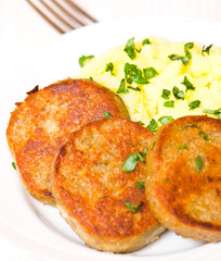 fishcakes with mashed potatoes