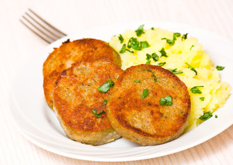 fishcakes with mashed potatoes
