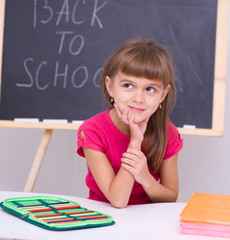 Portrait of a little girl in school