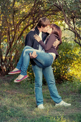 romantic young couple kissing...
