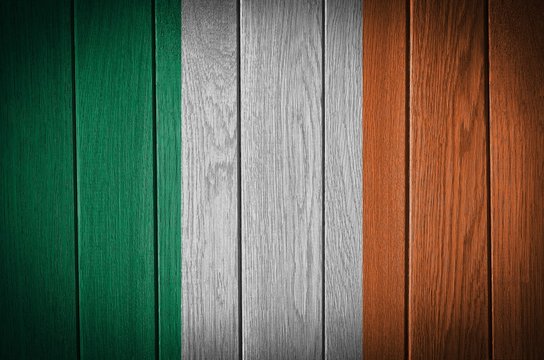 Ireland Flag painted on old wood plank background