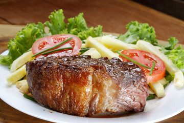 Dish with vegetables and roasted meat