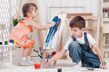 Little boy and girl painted in his studio © Alexandr Vasilyev