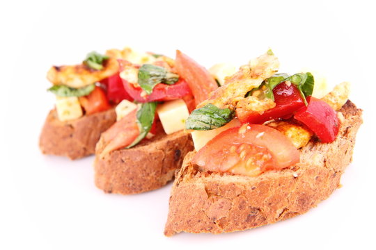 Sandwiches with chicken, tomato, cheese and bell pepper