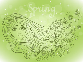 Spring girl portrait with blooming flowers