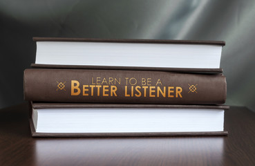 Learn to be a better listener. Book concept. - 60353157