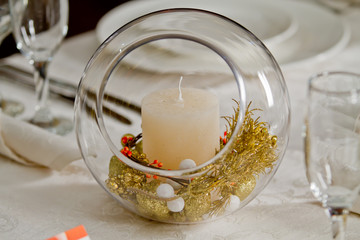 Candle on Fine Crystal Table Setting at a Restaurant