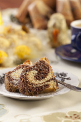 Cap of coffee with marable cake