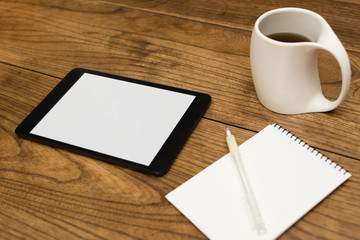 Digital tablet, coffee, notepad and pen - 60353763