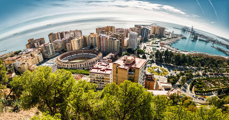Panoramic view of Malaga bullring and harbor. Spain