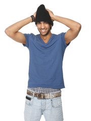 Smiling young man with denim jeans