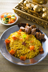 Arab rice, rice with meat and carrot in a bowl. Middle eastern f