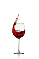 Red Wine Splashing in Glas