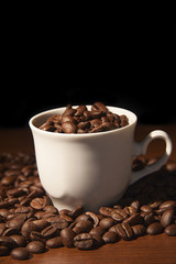 Coffee cup with coffee beans