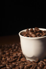Coffee cup with coffee beans