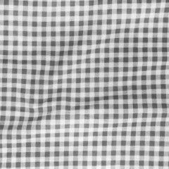Abstract texture of a black and white checkered textile