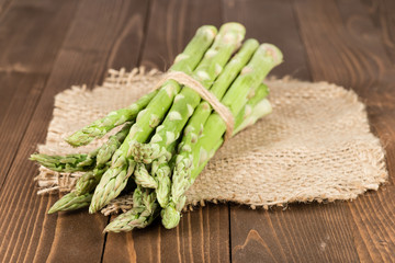 Asparagus on wood background