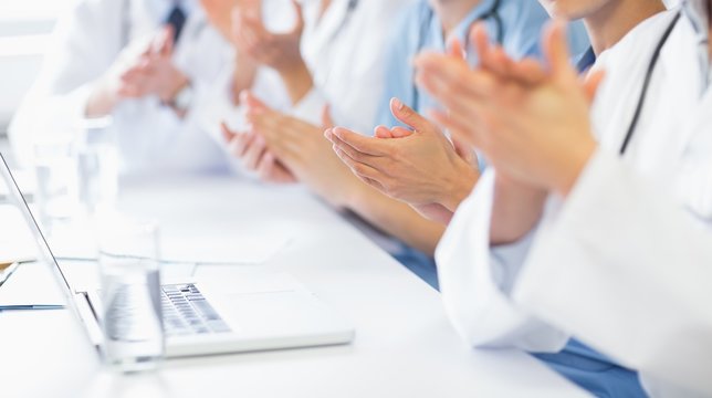 Medical team clapping