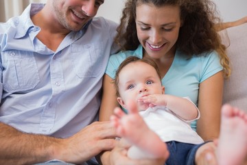 Parents looking at cute baby