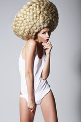 Ultramodern Hairstyle. Woman with Creative Art Wig with Braids