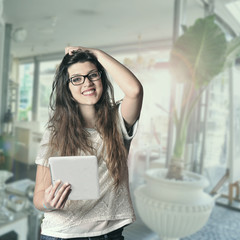 Cute girl with tablet computer