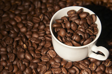 Coffee cup with coffee beans