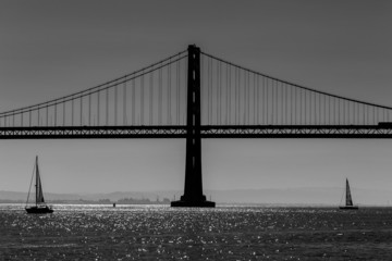 San Francisco Bay bridge sailboat from Pier 7 California