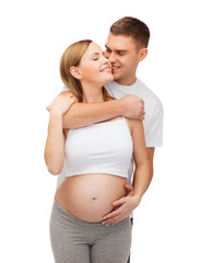 happy young family expecting child