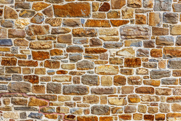 Wall built of natural stone