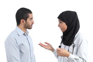 Arab doctor talking with a patient