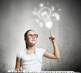 School girl with piano