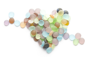 translucent colored stones and hear