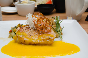 Pork chops with pumpkin sauce