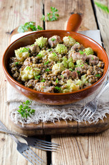 Green lentils with homemade sausage and cabbage romanesco