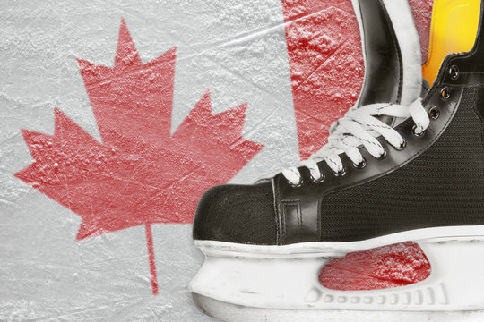 Hockey skates and Canadian flag