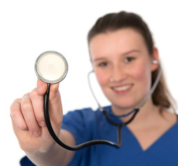 young female doctor showing the stethoscope